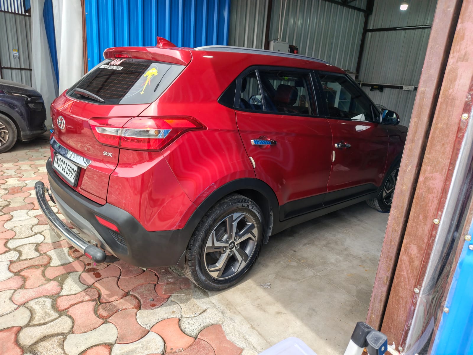 Red Hatchback Detailing